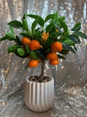 Faux orange tree in pot